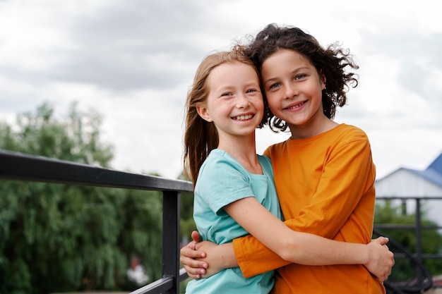 Free photo siblings spending time together at home