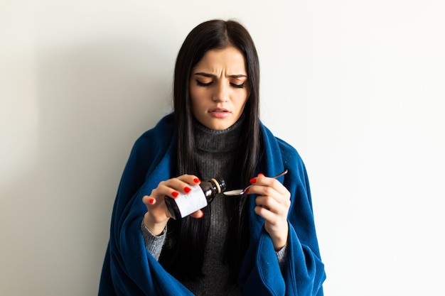 Free photo sick woman, flu woman. caught cold.shallow depth of field, young woman take tratament at home