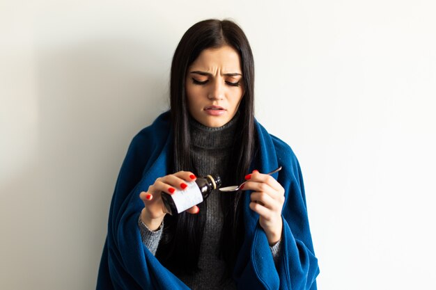 Sick Woman, Flu Woman. Caught Cold.shallow depth of field, Young woman take tratament at home