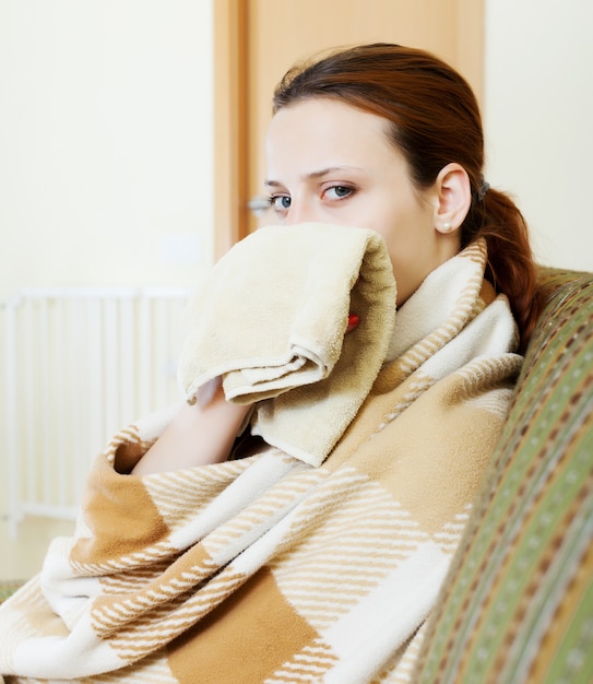 sick woman in plaid