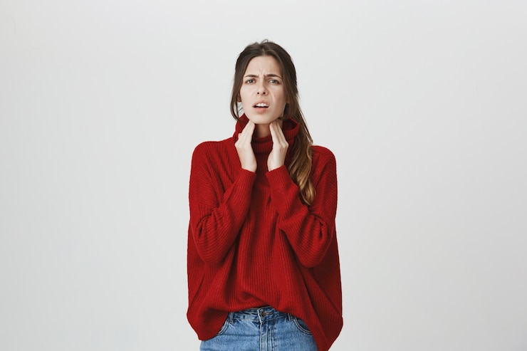 Free Photo sick woman touching neck, have inflamation, sore throat