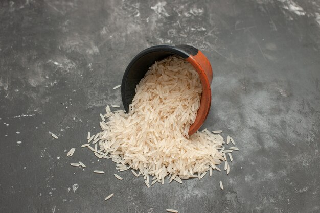 Side close-up view rice brown-black bowl of rice on the table