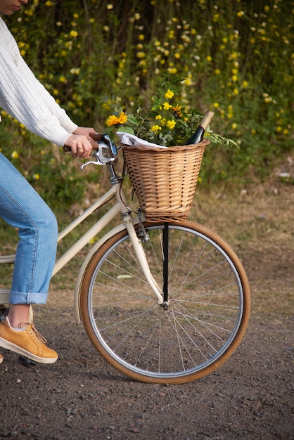 Side view adult riding bicycle