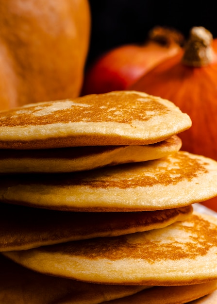 Side view assortment with pancakes in foreground