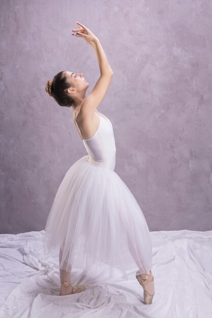 Side view ballerina standing position