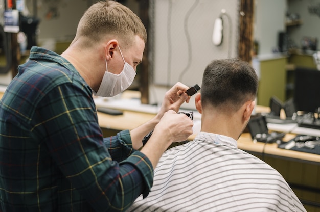 Free photo side view of barber shop concept