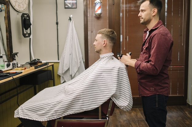 Side view of barber shop concept