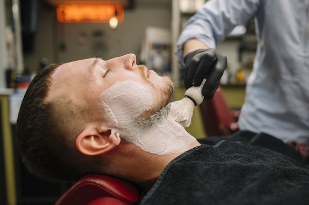 Free photo side view of barbershop concept