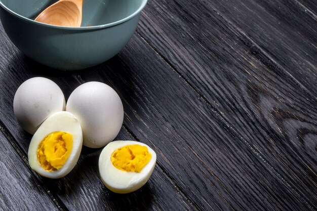 Side view of boiled eggs on wooden rustic