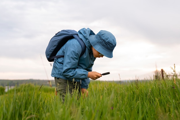 Side view boy exploring nature