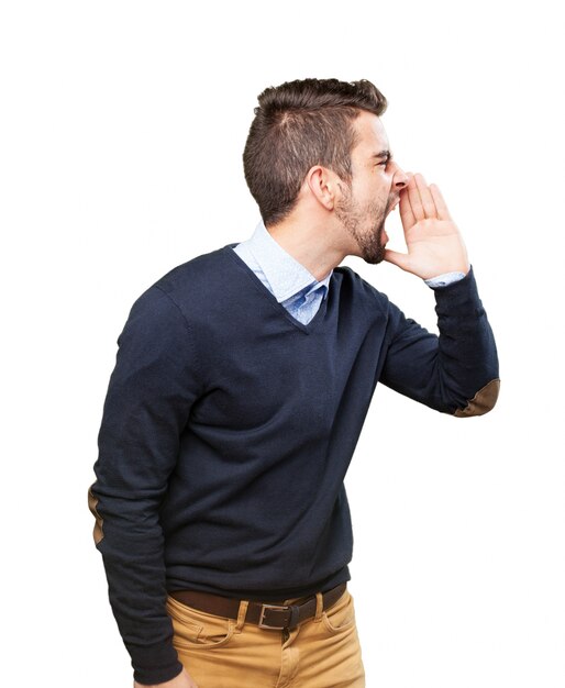 Side view of boy yelling at someone