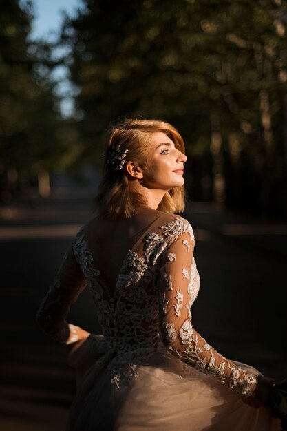 Side view bride posing outdoors