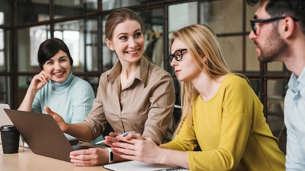 Side view of businesspeople during a meeting indoors