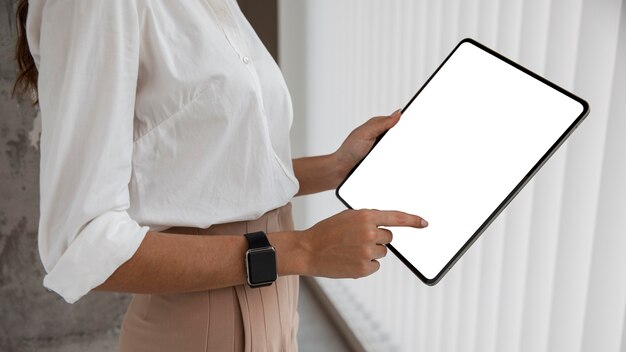 Side view of businesswoman with tablet