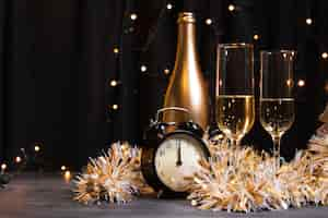 Free photo side view champagne for new year night