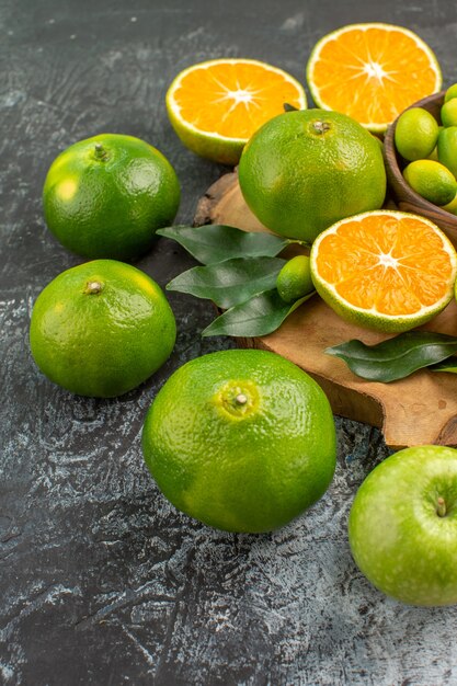 Side view citrus fruits the appetizing citrus fruits on the cutting board