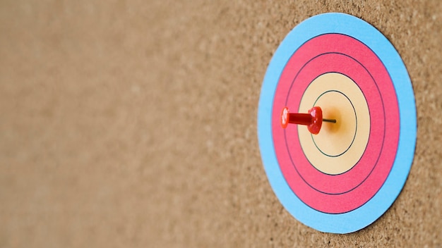 Side view of colorful target with pin on bull's-eye