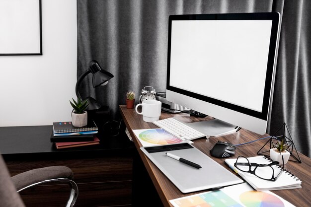 Side view of computer screen on office workspace