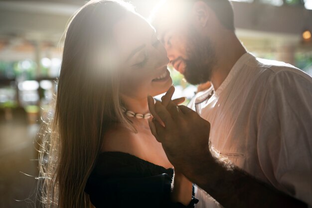 Side view couple dancing together