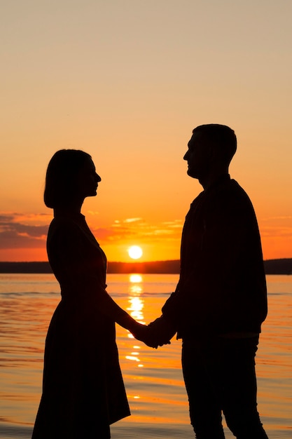 Side View Couple Holding Hands – Free Download