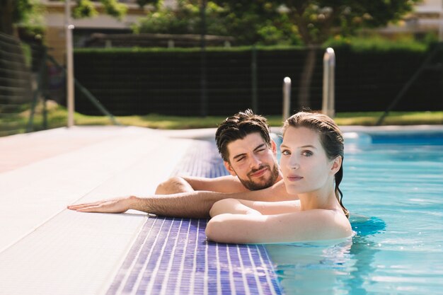 Side view couple in pool