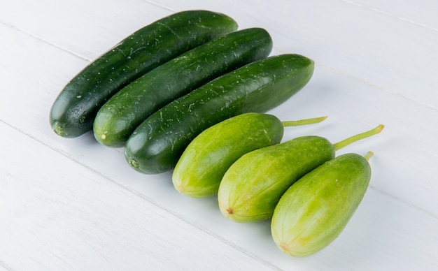 Side view of cucumbers on wooden surface
