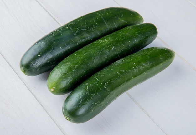 Side view of cucumbers on wooden surface