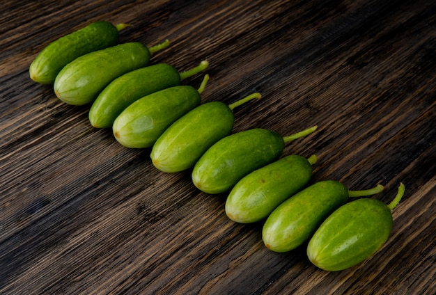 Side view of cucumbers on wooden table