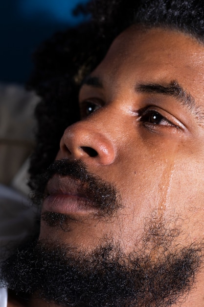 Side view depressed man crying