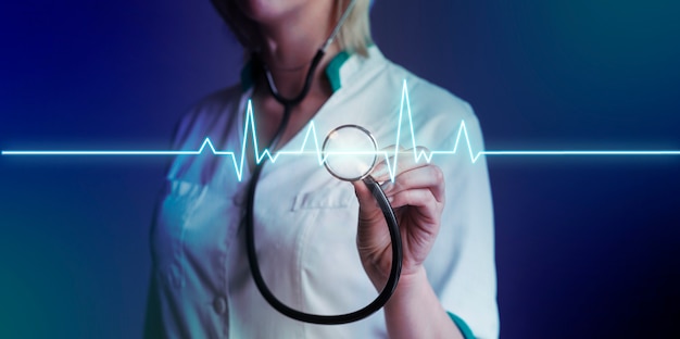 Side view doctor holding stethoscope