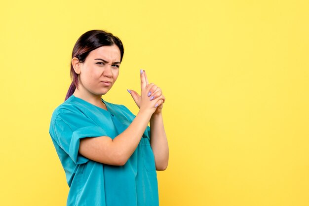 Side view of a doctor is sure that she will help patients with serious illnesses