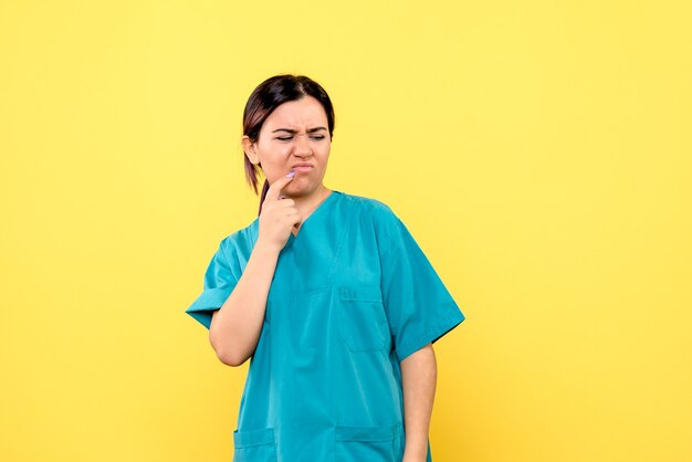 Side view of a doctor is surprised by the analyzes of patient