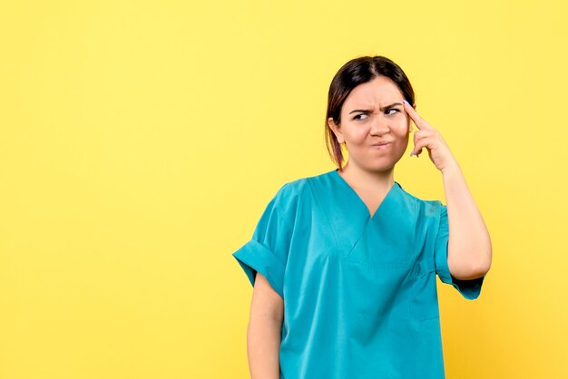 Side view of a doctor is surprised by the behavior of the patients with illness