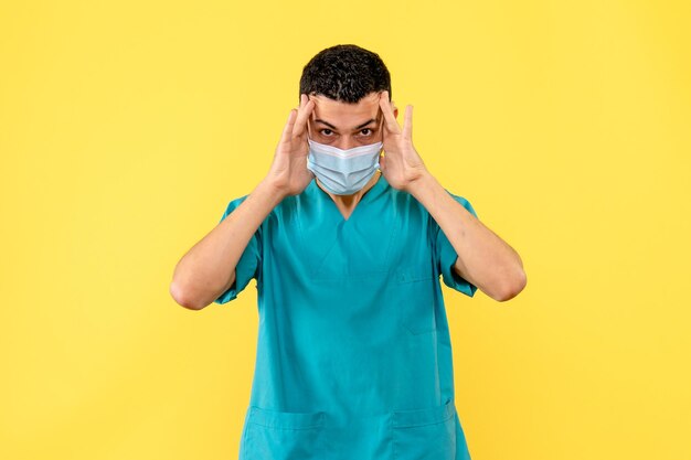 Side view of a doctor in mask posing