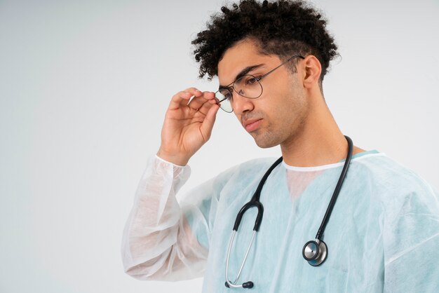 Side view doctor wearing stethoscope