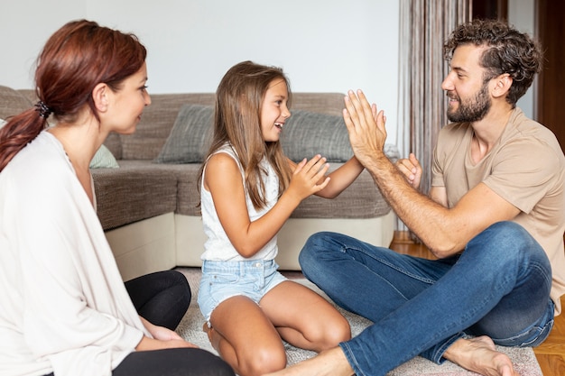 Side view of family playing together