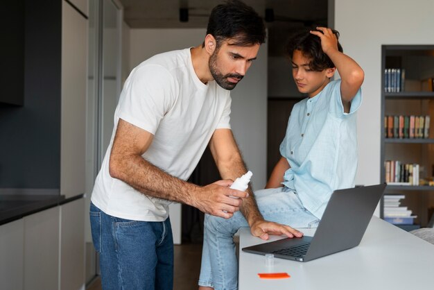 Side view father holding lice treatment