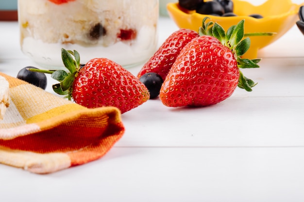 Side view of fresh ripe strawberries on the table