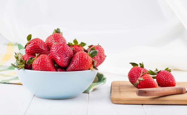 Side view fresh strawberry on white background