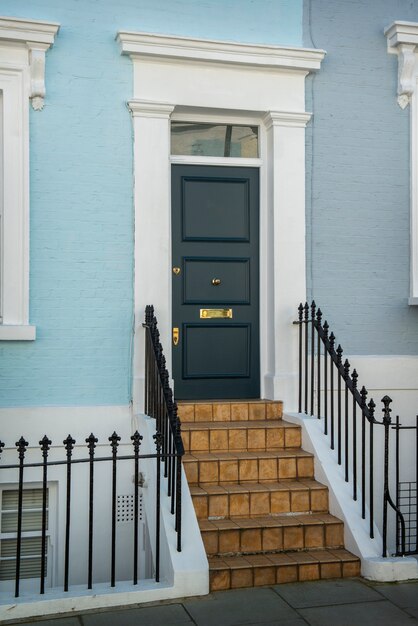 Side view of front door with blue wall