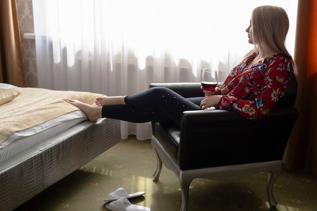 Side view girl in bedroom looking away