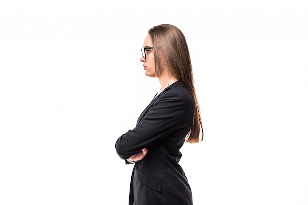 Side view of a girl standing in black suite isolated on white