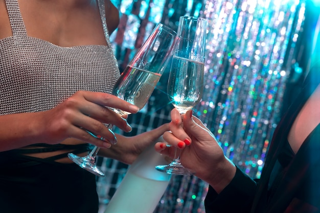 Side view girls holding drinks