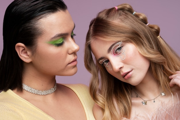 Side view girls posing together in studio