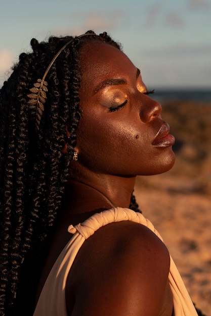 Free photo side view greek goddess posing in nature