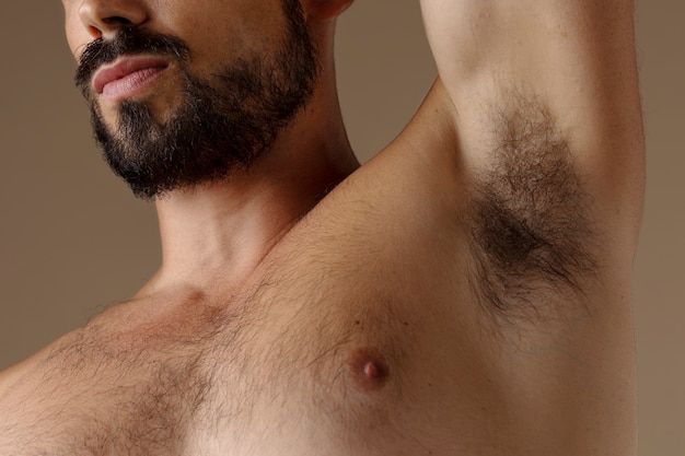 Side view hairy man posing