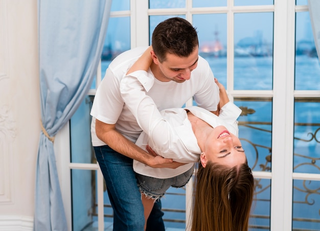 Side view of happy couple dancing