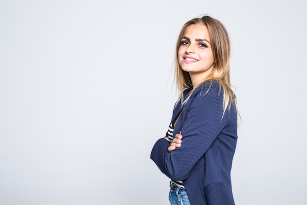 Side view of happy woman with crossed arms