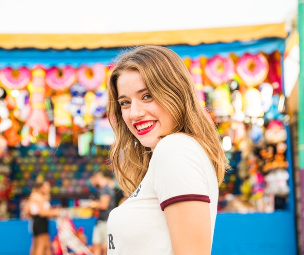 Side view of a happy young woman