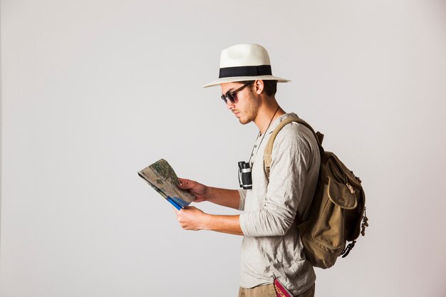 Side view of hipster traveler